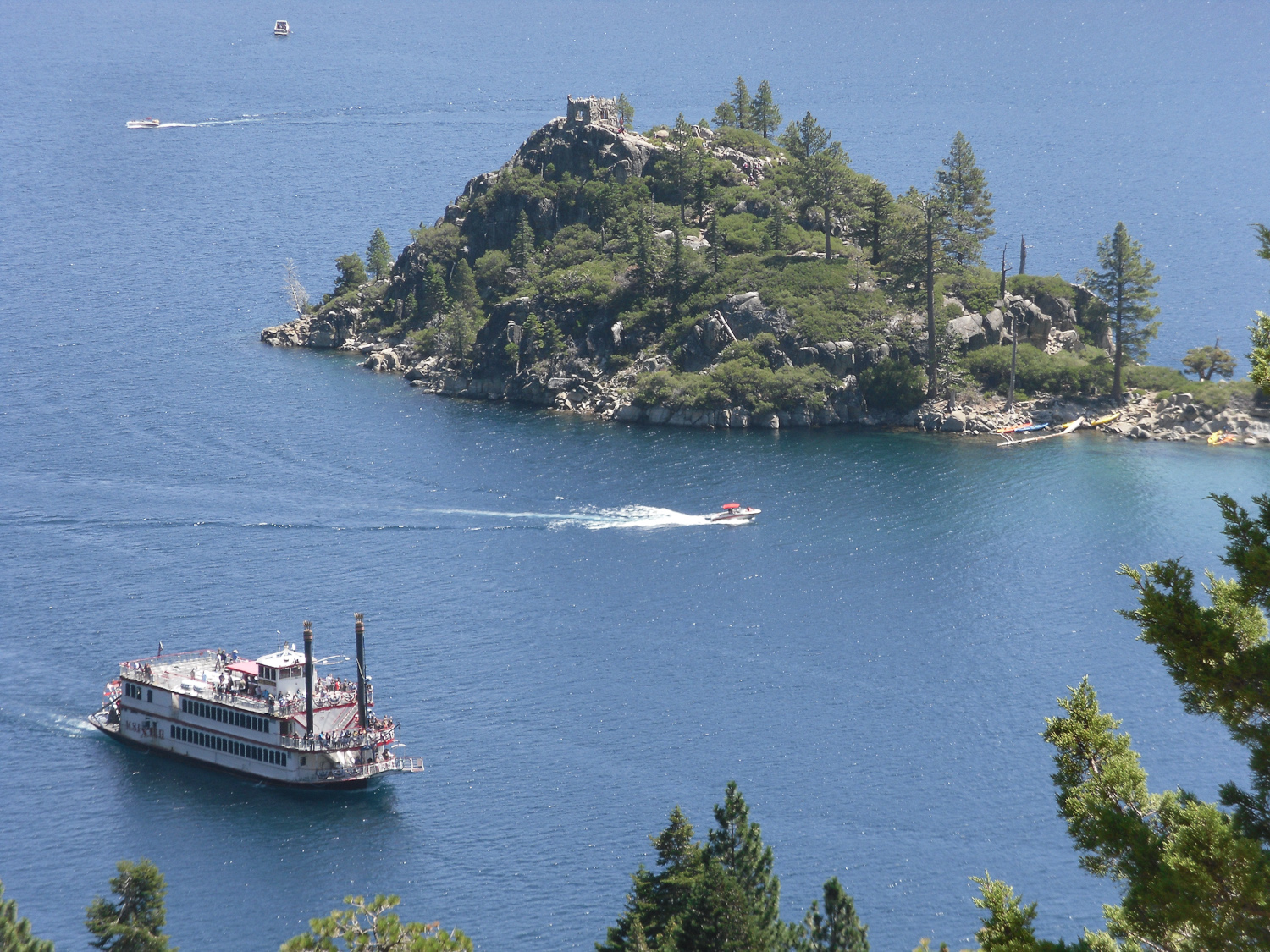 Views of Fannette Island in Emerald Bay from trail to Vikingsholm- Tahoe Queen in foreground